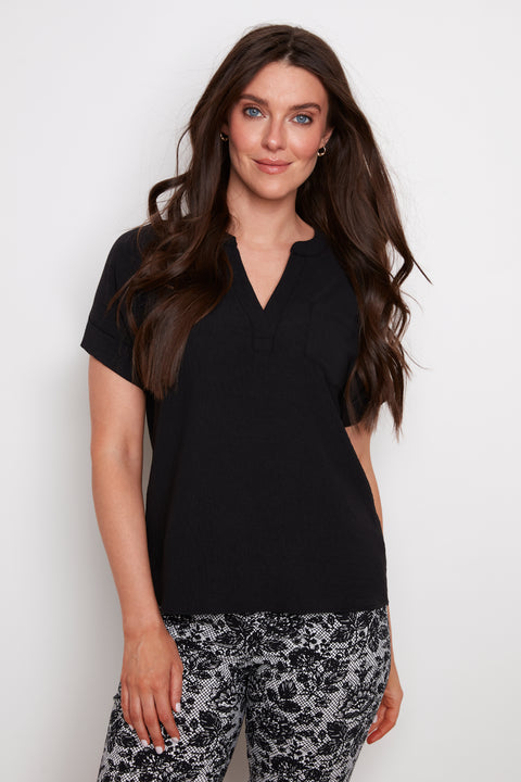 Model wearing UP! Air Flow Short Sleeve Top in Black, front view.