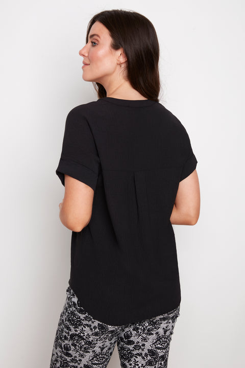Back view of model wearing UP! Air Flow Short Sleeve Top in Black.
