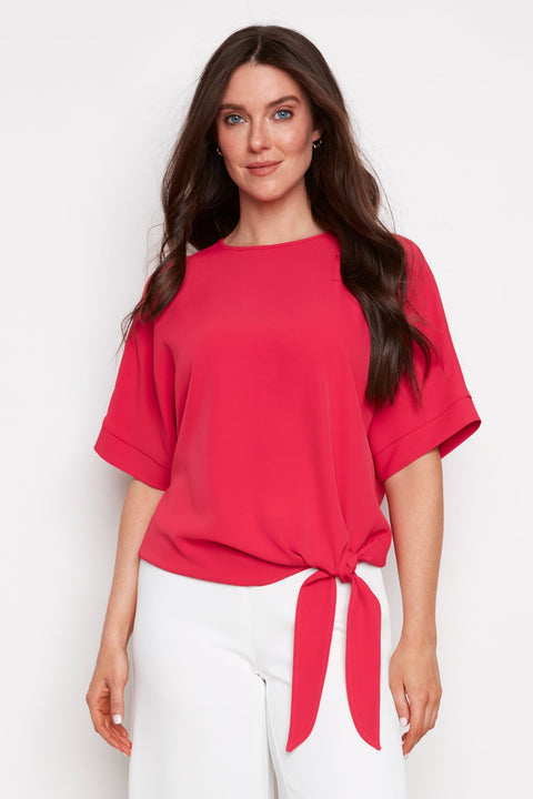 Model wearing UP! Vegan Silk Tie Knot T-Shirt in Dahlia, front view.