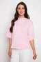 Model wearing UP! Provence Short Sleeve Top in Peony, front view.