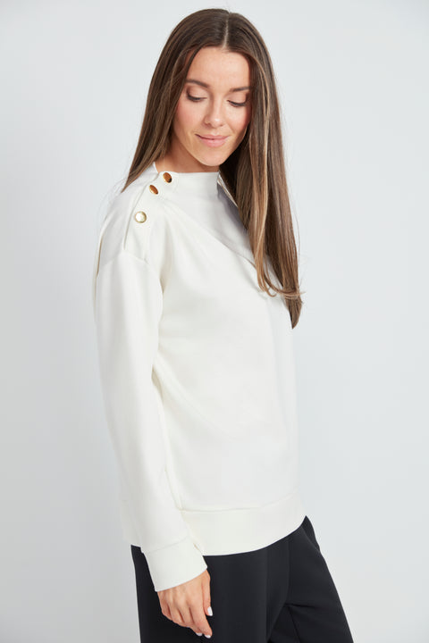 Side view of the Butter 3-Button Top in Ivory.