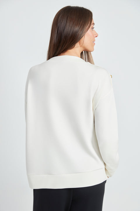 Back view of the Butter 3-Button Top in Ivory.