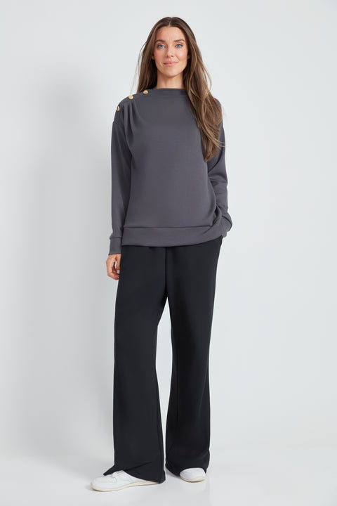 Woman wearing the Butter 3-Button Top in Slate, front view.