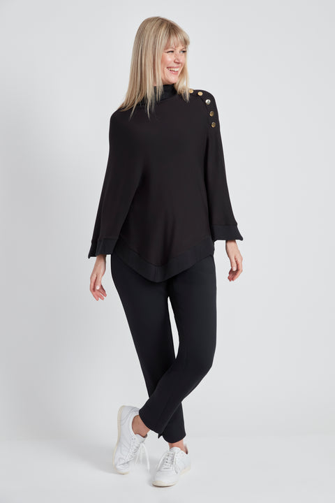Woman wearing the Butter Cape in Black.