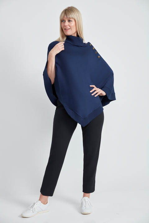 Woman wearing the Butter Cape in Harbor Blue