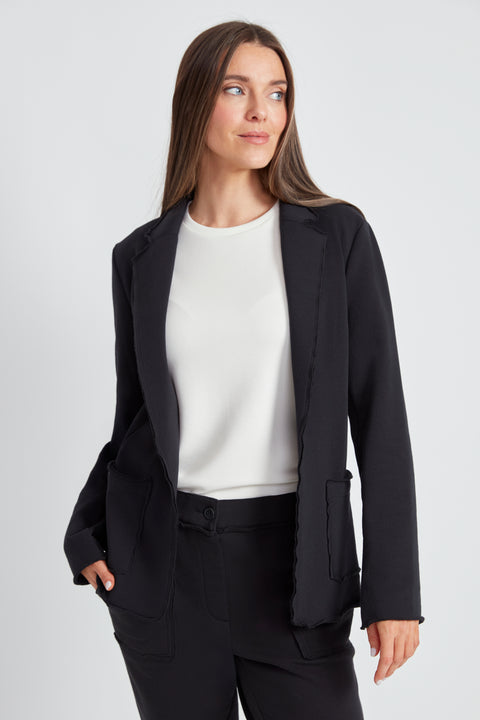 Woman wearing the French Terry Raw Edge Blazer in Black.