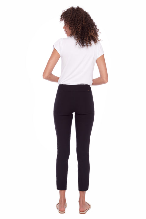 Back view of model wearing UP! Techno Core Petal-Slit Ankle Pant in Black.