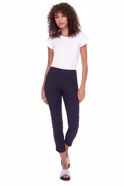 Model wearing UP! Techno Core Petal-Slit Ankle Pant in Navy, front view.