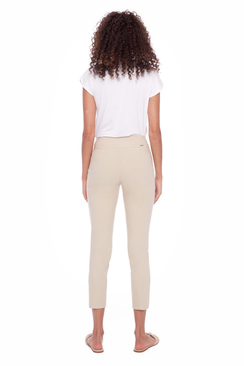 Back view of model wearing UP! Techno Core Petal-Slit Ankle Pant in Sand.