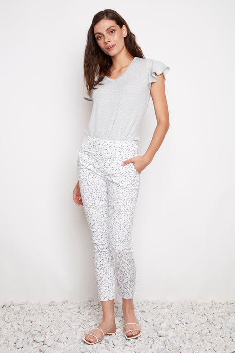 Model wearing UP! Pebbles Techno Petal-Slit Ankle Pant in Pebbles print, front view.