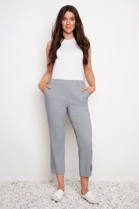 Model wearing UP! Navy Stripe Techno Button-Tab Crop Pant in Navy/White Stripe, front view.