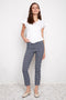 Model wearing UP! Coastal Techno Button-Vent Ankle Pant in Coastal print, front view.