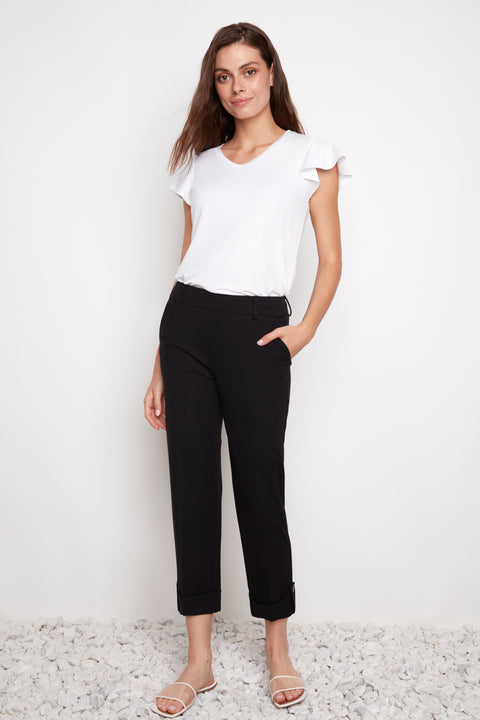 Model wearing UP! Compression Techno Button-Cuff Straight Leg Crop Pant in Black, front view.