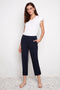 Model wearing UP! Compression Techno Button-Cuff Straight Leg Crop Pant in Navy, front view.