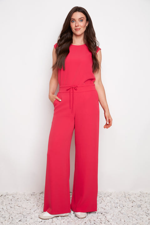 Model wearing UP! Vegan Silk Wide-Leg Full-Length Pant in Dahlia, front view.