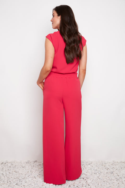 Back view of model wearing UP! Vegan Silk Wide-Leg Full-Length Pant in Dahlia.