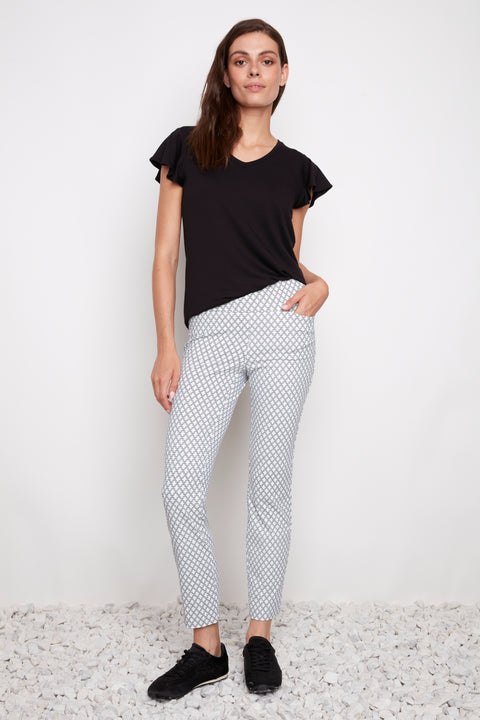 Front view of model wearing UP! Casa Soft Stream Ankle Pant in Casa print.