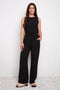Model wearing UP! Air Flow Wide Leg Pant in Black, front view.