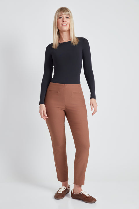Woman wearing the Armani Petal-Vent Slim Pocket Pant in Cacao Nibs, front view.