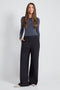 Woman wearing the Precision Ponte Wide Leg Pant in Black.