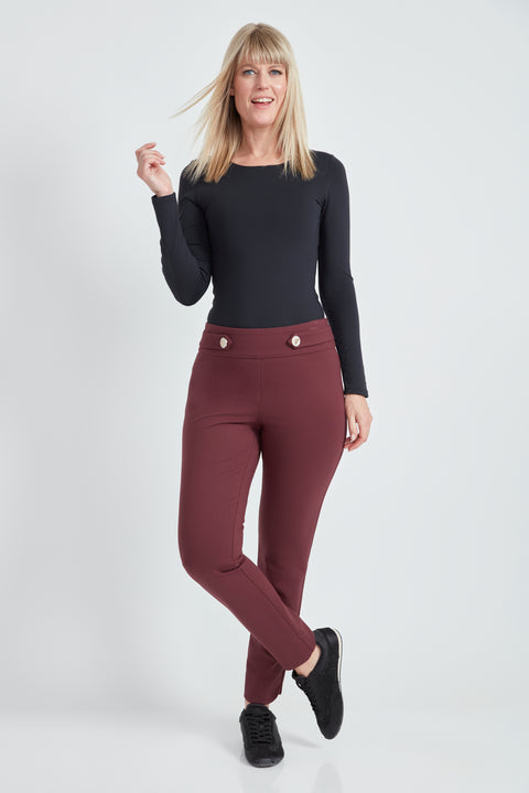 Woman wearing the Ponte Petal-Vent Button-Tab Slim Pant in Merlot.