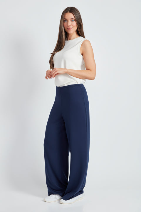 Woman wearing the Provence Wide-Leg Pant in Harbor Blue, side view.