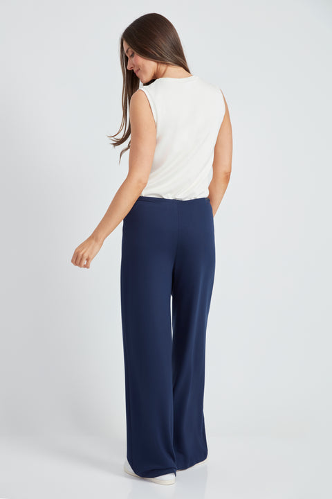 Woman wearing the Provence Wide-Leg Pant in Harbor Blue, side view.