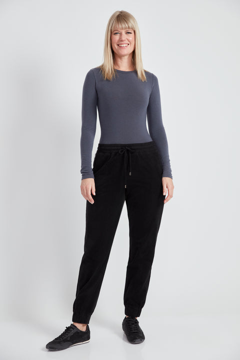 Woman wearing the Knit Corduroy Jogger in Black.