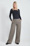 Woman wearing the Ponte Chester Plaid Wide Leg Pant, front view.