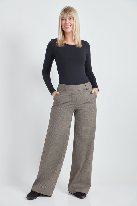 Woman wearing the Ponte Chester Plaid Wide Leg Pant, front view.