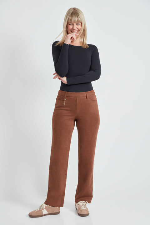 Woman wearing the Suede Straight-Leg Pendant Pant in Tobacco.