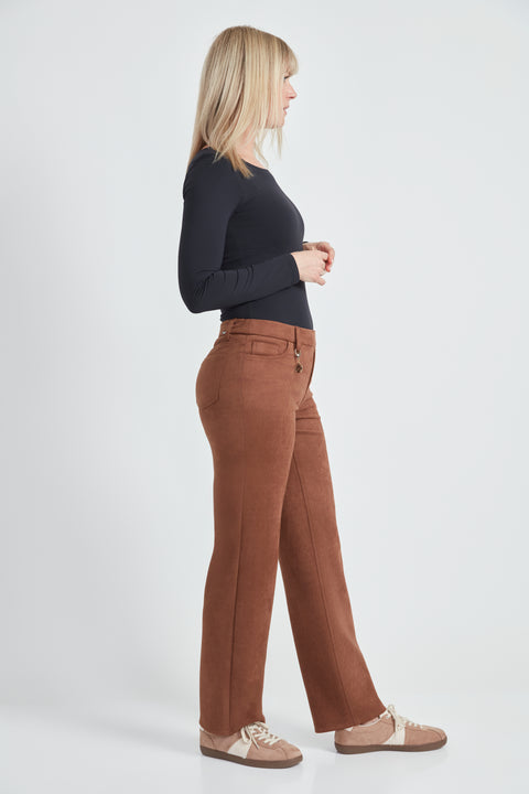 Woman wearing the Suede Straight-Leg Pendant Pant in Tobacco, side view.