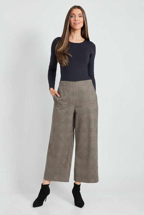 Woman wearing Ponte Chester plaid cropped gaucho wide-leg pants, front view