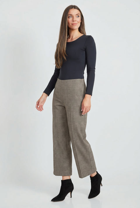 Woman wearing Ponte Chester plaid cropped gaucho wide-leg pants, side view
