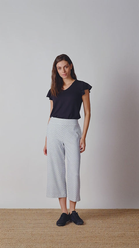 Video of model wearing UP! Casa Soft Stream Wide Leg Cropped Pant in Casa print.