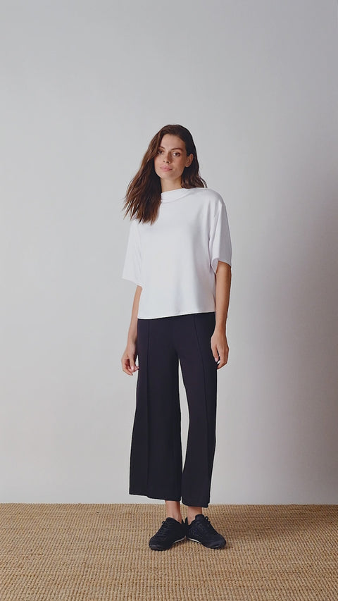 Video of model wearing UP! Provence Wide Leg Pintuck Crop Pant in Black