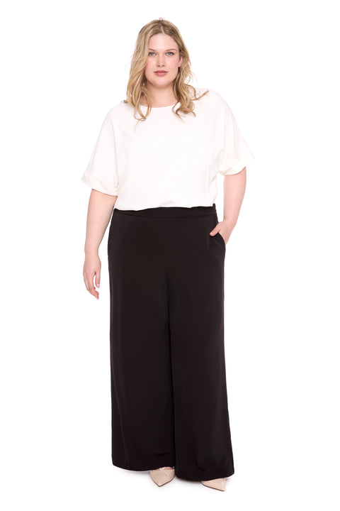 Model wearing vegan silk 261101_WideLeg_Black_Front, sizes 1X–3X.