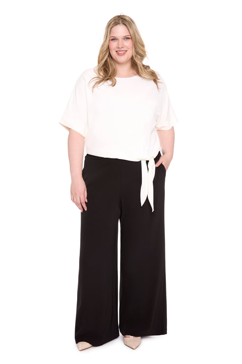 Model wearing vegan silk 261101_WideLeg_Black_Front, sizes 1X–3X.