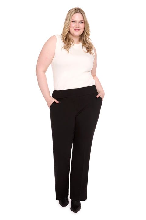 Model wearing ponte 261104_Bootcut_Black_Front, sizes 1X–3X.