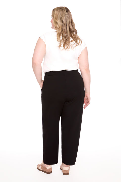 Model wearing 261127_Lantern_Black_Back, sizes 1X–3X.