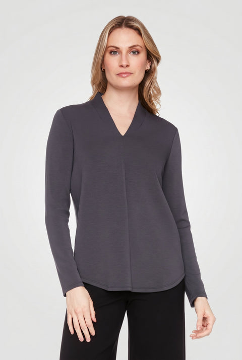 Woman wearing the Butter V-Neck Top in Slate, front view.