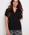 Model wearing UP! Air Flow Short Sleeve Top in Black, front view.