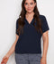 Model wearing UP! Air Flow Short Sleeve Top in Navy, front view.