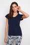 Model wearing UP! Provence V-Neck Ruffle Sleeve Top in Navy, front view.