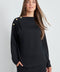 Woman wearing the Butter 3-Button Top in Black, front view.