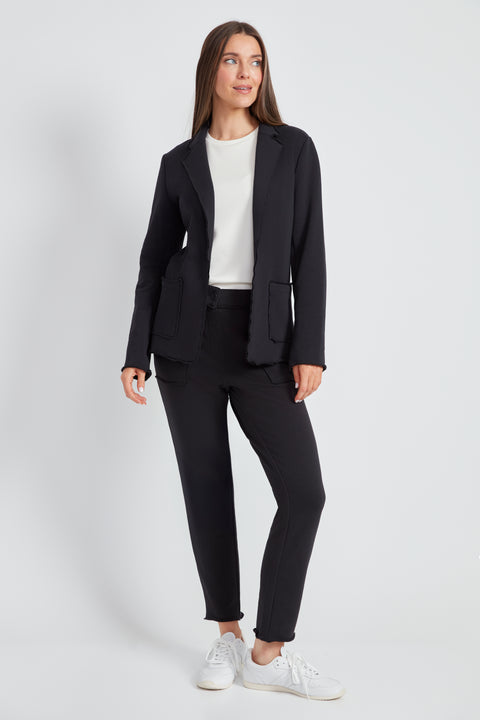 Woman wearing the French Terry Raw Edge Blazer in Black.