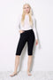 Model wearing UP! Techno Vented Bermuda Short in Black, front view.