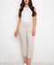 Model wearing UP! Linen Effect Techno Cropped Front-Cuff Pant in Linen, front view.