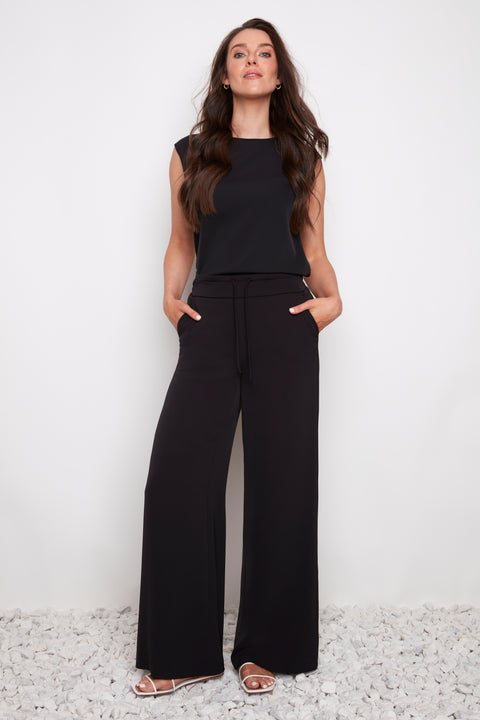 Model wearing UP! Vegan Silk Wide-Leg Full-Length Pant in Black, front view.