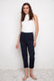 Model wearing UP! Compression Slim Front-Cuff Crop Pant in Navy, front view.